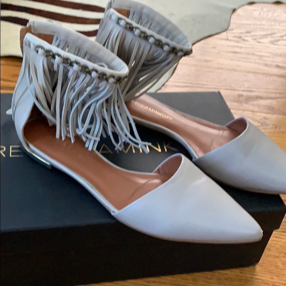 Like new stunning fringe flats